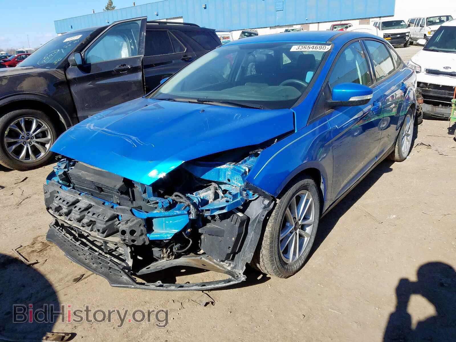 2016 FORD FOCUS - VIN: 1FADP3F22GL386796 - Фото 2