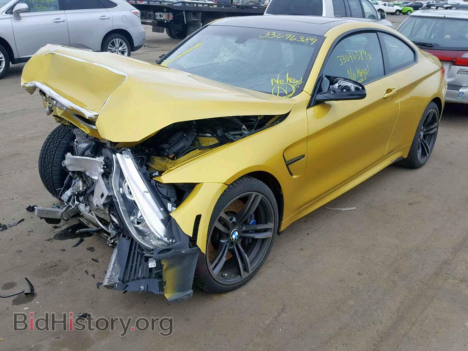 2015 BMW M4 - VIN: WBS3R9C59FK332975 - Фото 2