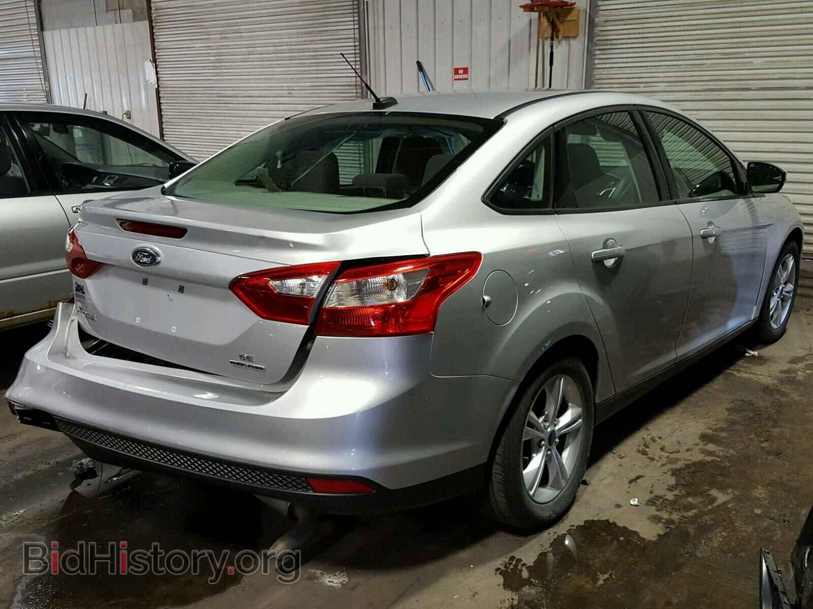 2014 FORD FOCUS - VIN: 1FADP3F2XEL348522 - Photo 4