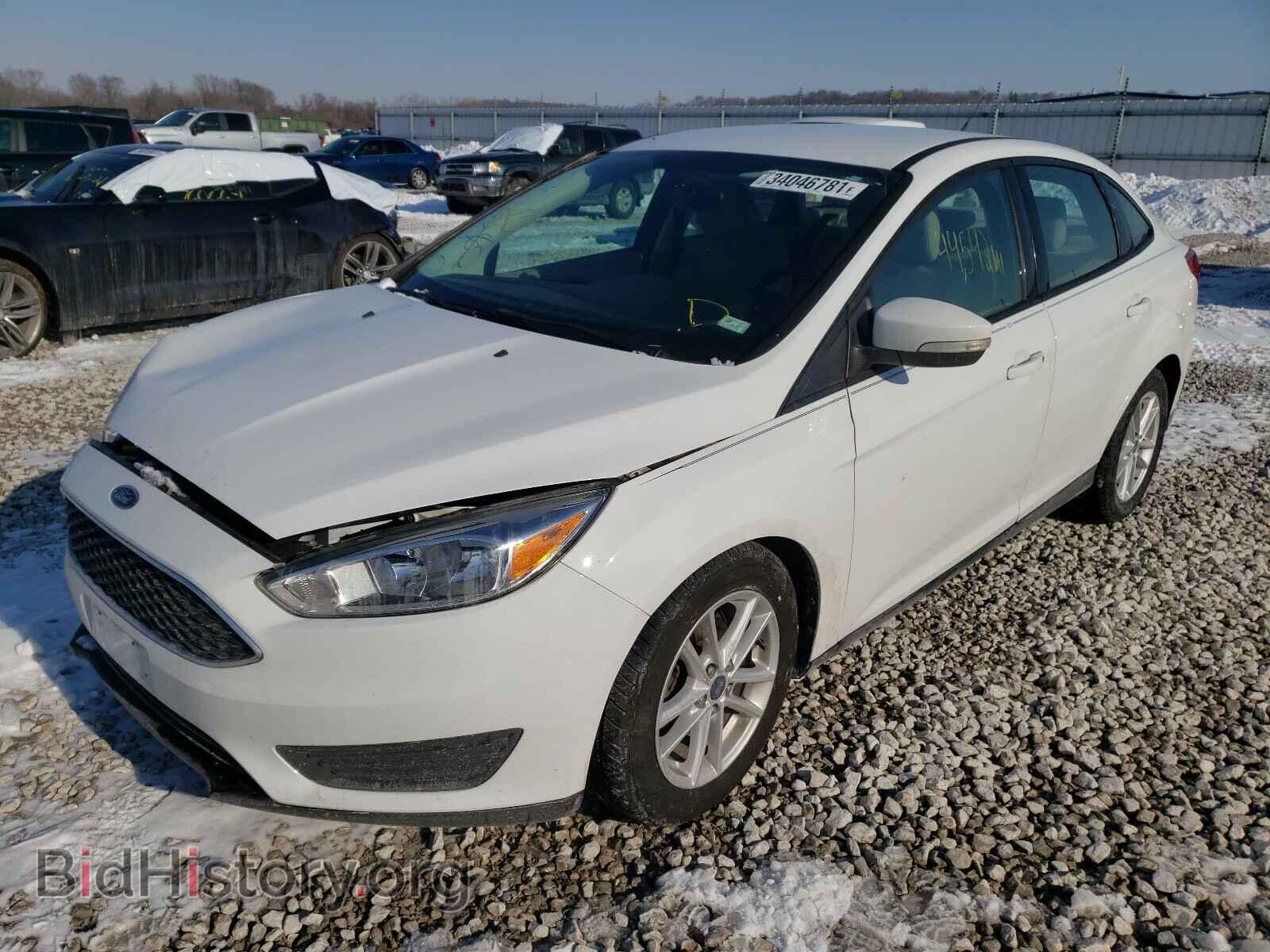 2016 FORD FOCUS - VIN: 1FADP3F20GL387428 - Фото 2