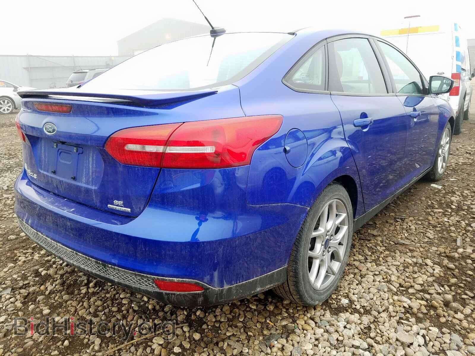 2015 FORD FOCUS - VIN: 1FADP3F23FL312477 - Photo 4