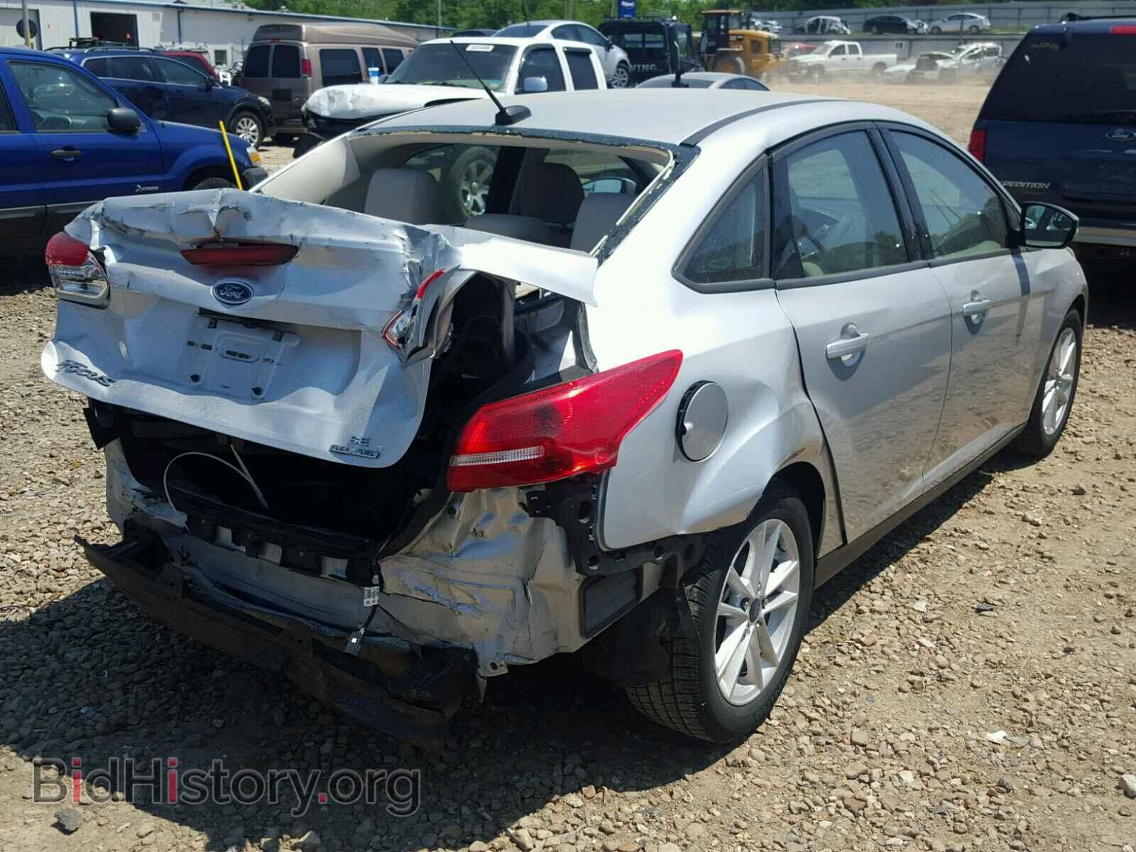 2015 FORD FOCUS - VIN: 1FADP3F22FL218994 - Photo 4