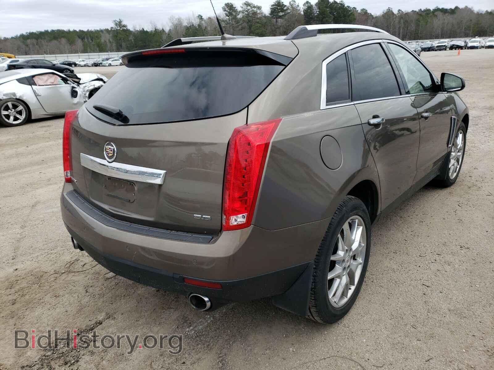 2014 CADILLAC SRX - VIN: 3GYFNCE31ES544985 - Фото 4