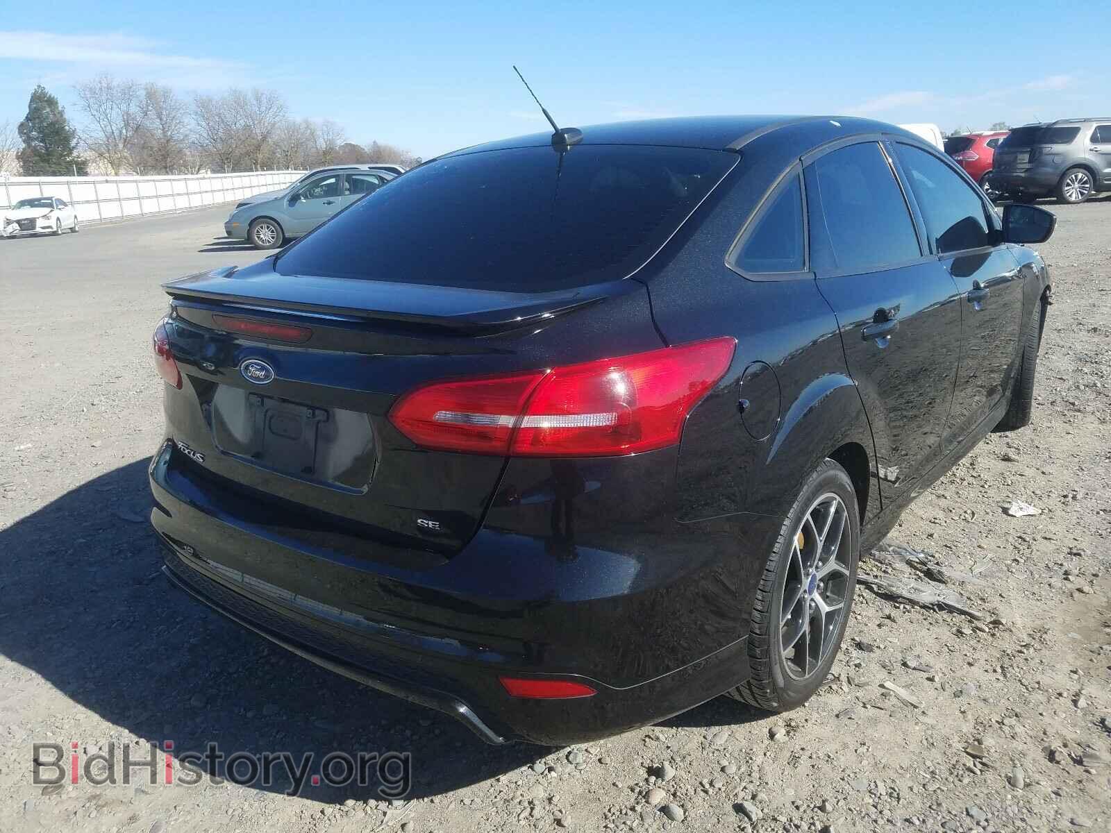 2015 FORD FOCUS - VIN: 1FADP3F21FL341900 - Photo 4