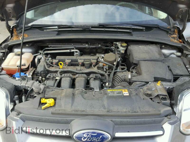 2014 Ford FOCUS (VIN 1FADP3F29EL121371) — photo 7 of 10