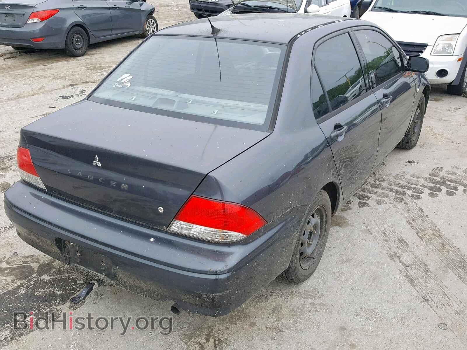 2002 MITSUBISHI LANCER - VIN: JA3AJ26EX2U011694 - Photo 4