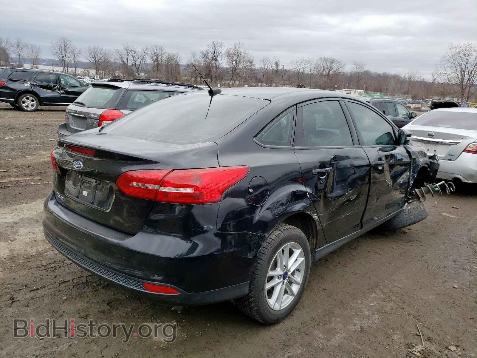 2016 FORD FOCUS - VIN: 1FADP3F21GL304878 - Photo 4