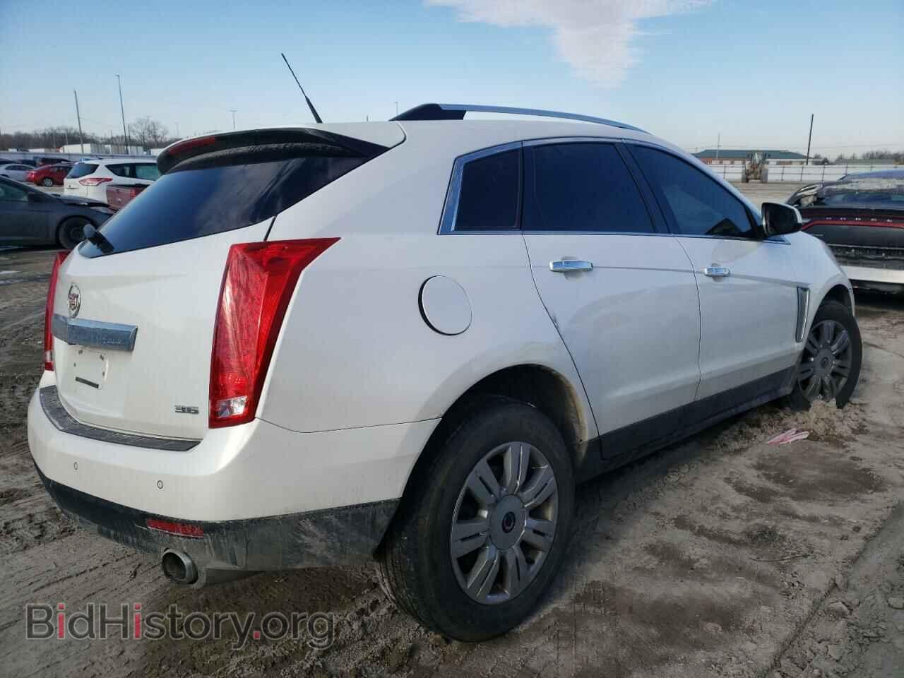 2014 CADILLAC SRX - VIN: 3GYFNBE39ES593507 - Фото 4