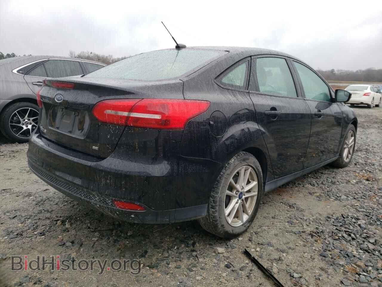 2017 FORD FOCUS - VIN: 1FADP3F22HL315115 - Photo 4