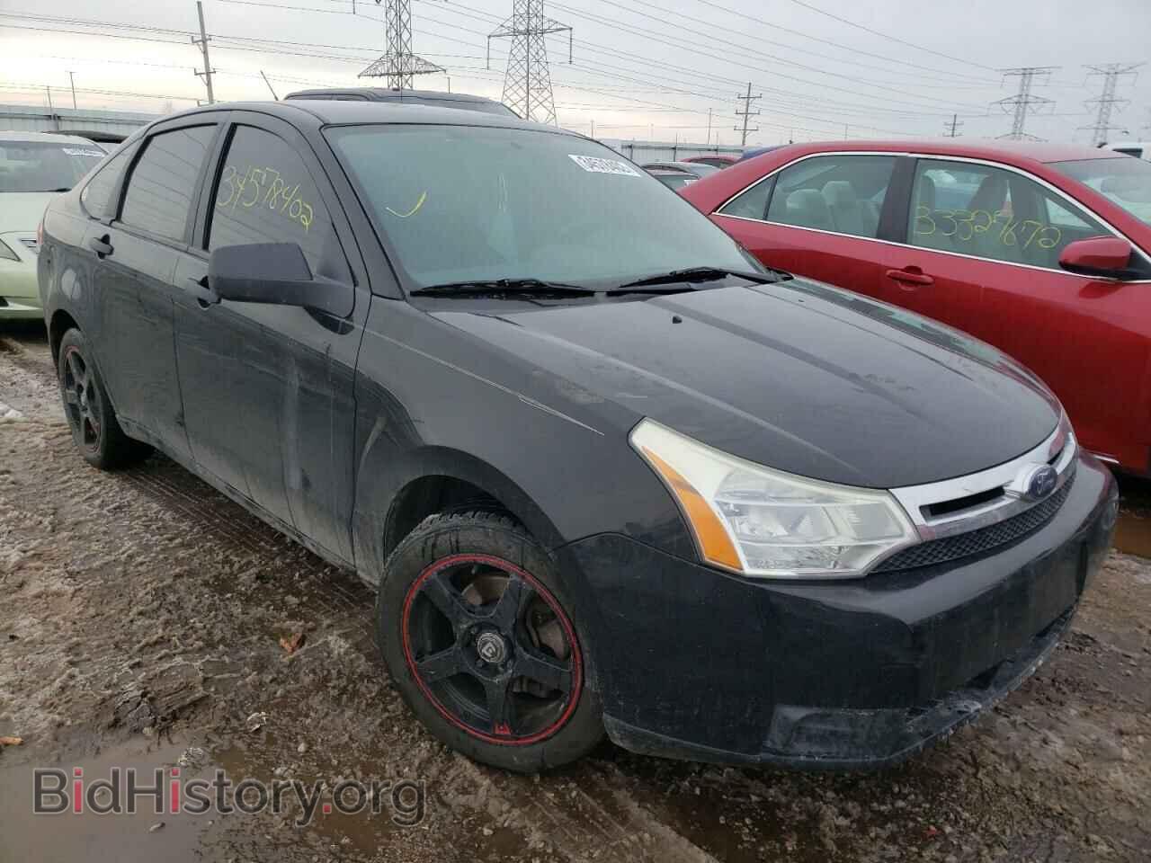 Фотография 1FAHP35N09W254621 - FORD FOCUS 2009