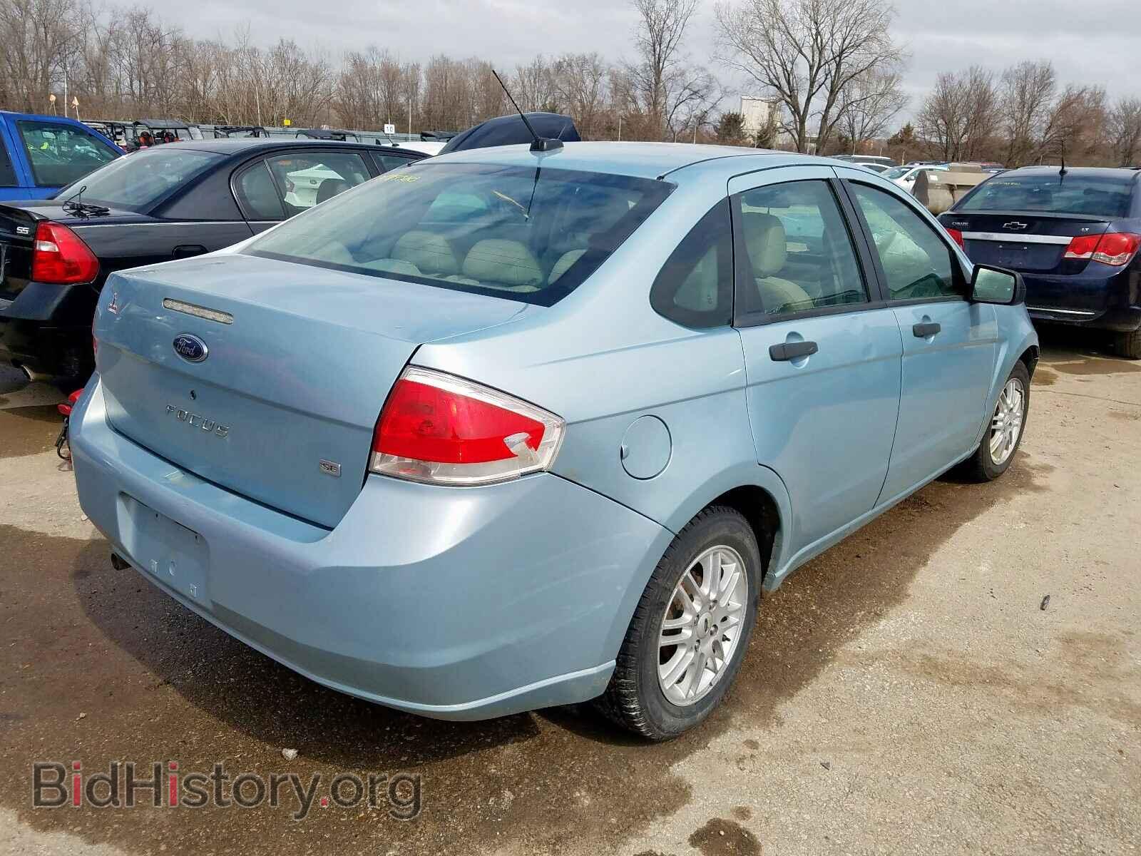 2009 FORD FOCUS - VIN: 1FAHP35N49W196920 - Photo 4