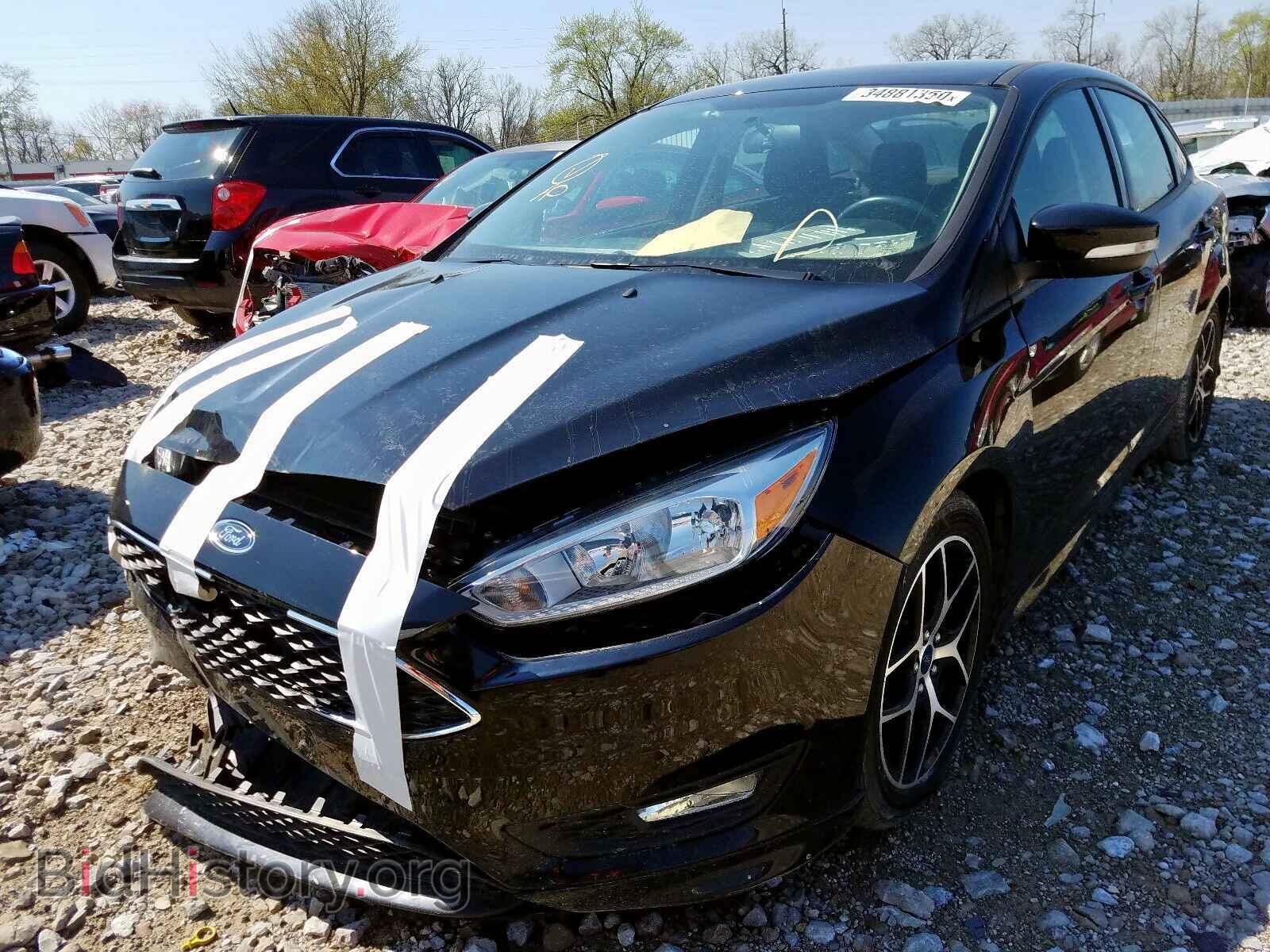 2016 FORD FOCUS - VIN: 1FADP3F27GL314573 - Photo 2