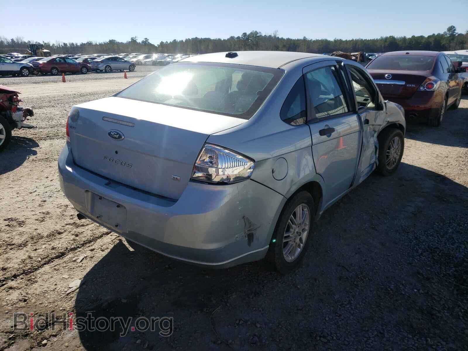 2009 FORD FOCUS - VIN: 1FAHP35N09W159766 - Photo 4