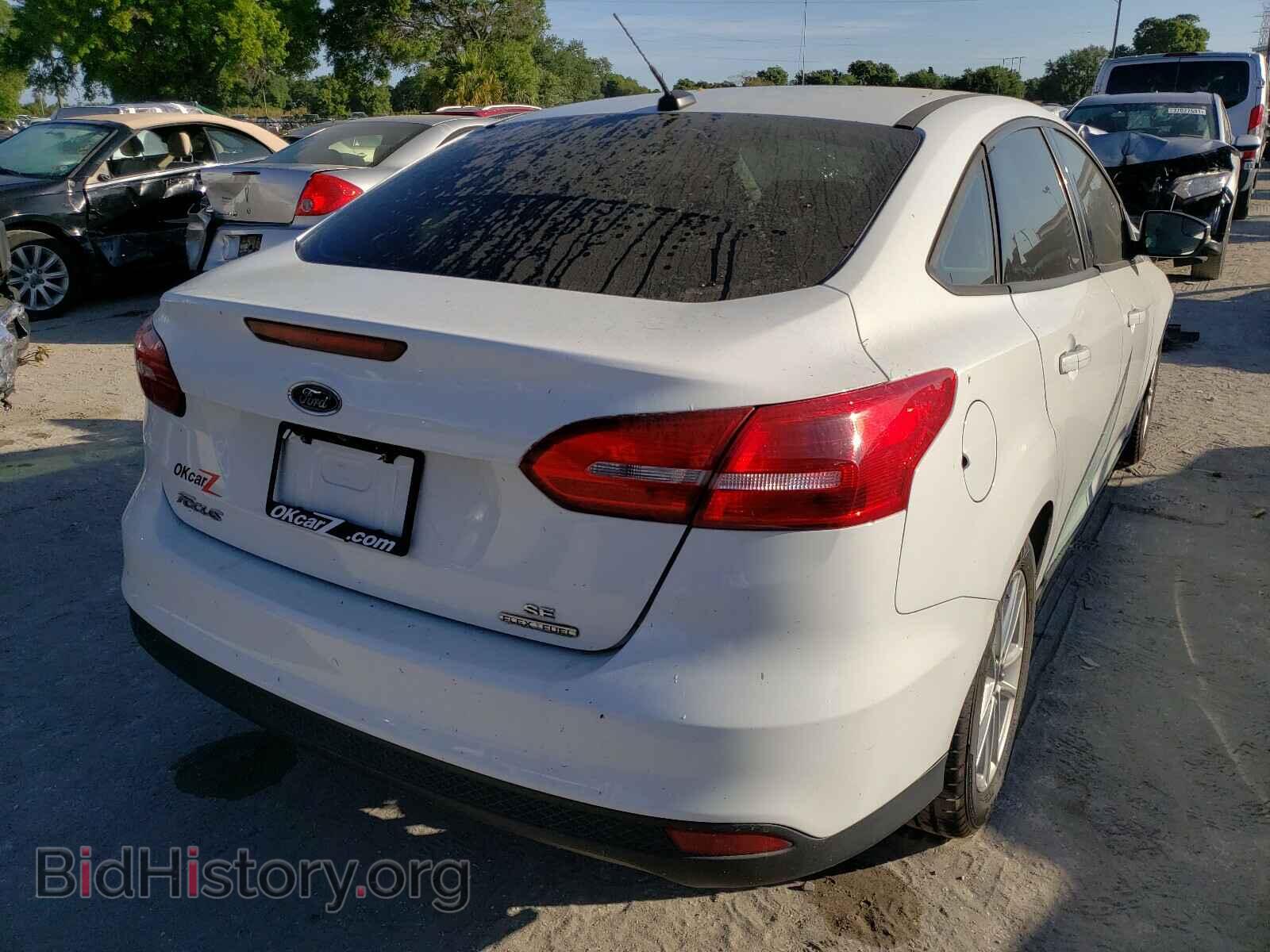2015 FORD FOCUS - VIN: 1FADP3F29FL215476 - Photo 4