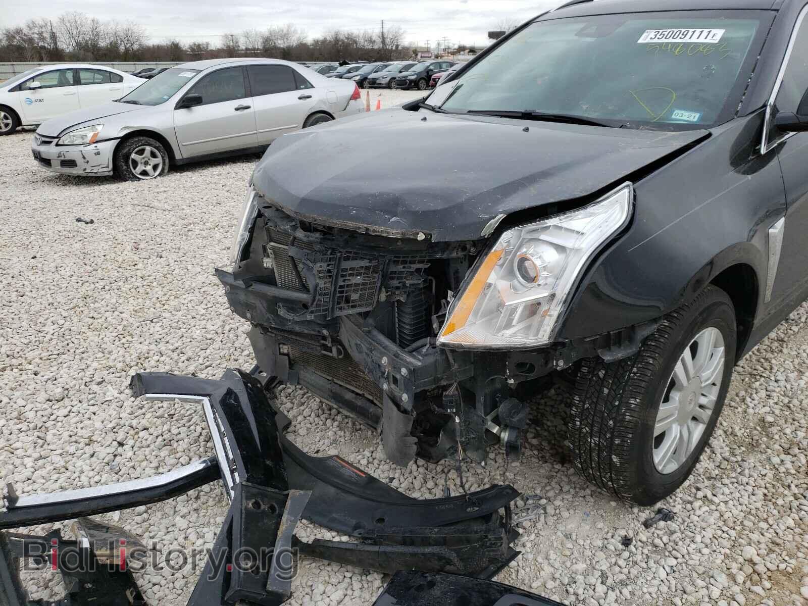 2014 CADILLAC SRX - VIN: 3GYFNBE30ES548083 - Фото 9