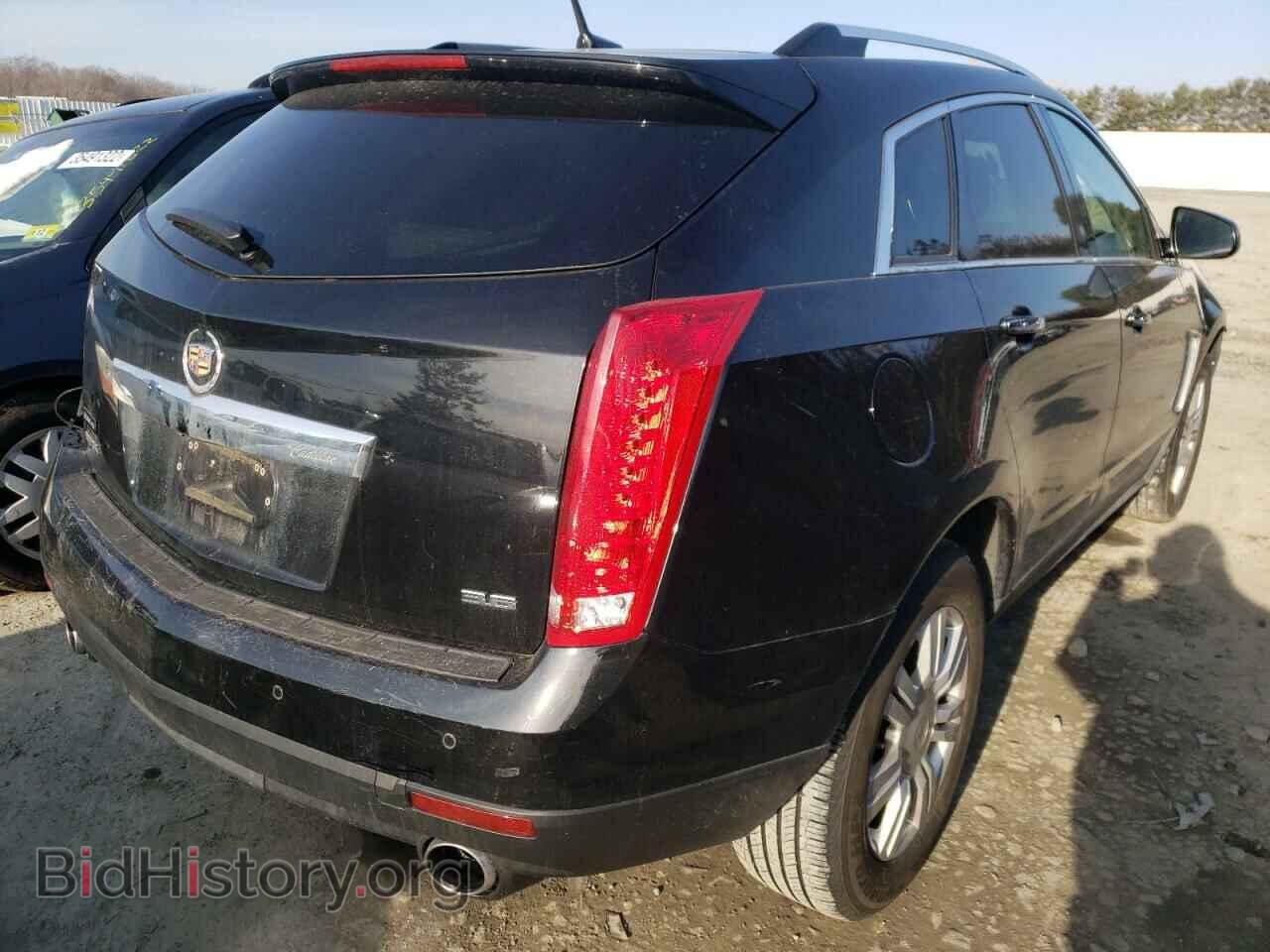 2013 CADILLAC SRX - VIN: 3GYFNCE39DS513417 - Фото 4