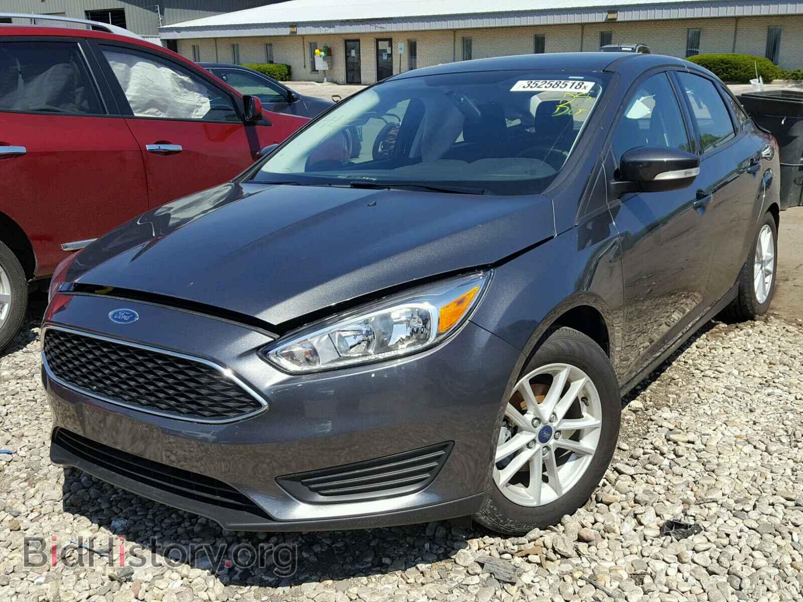 2016 FORD FOCUS - VIN: 1FADP3F20GL394587 - Фото 2
