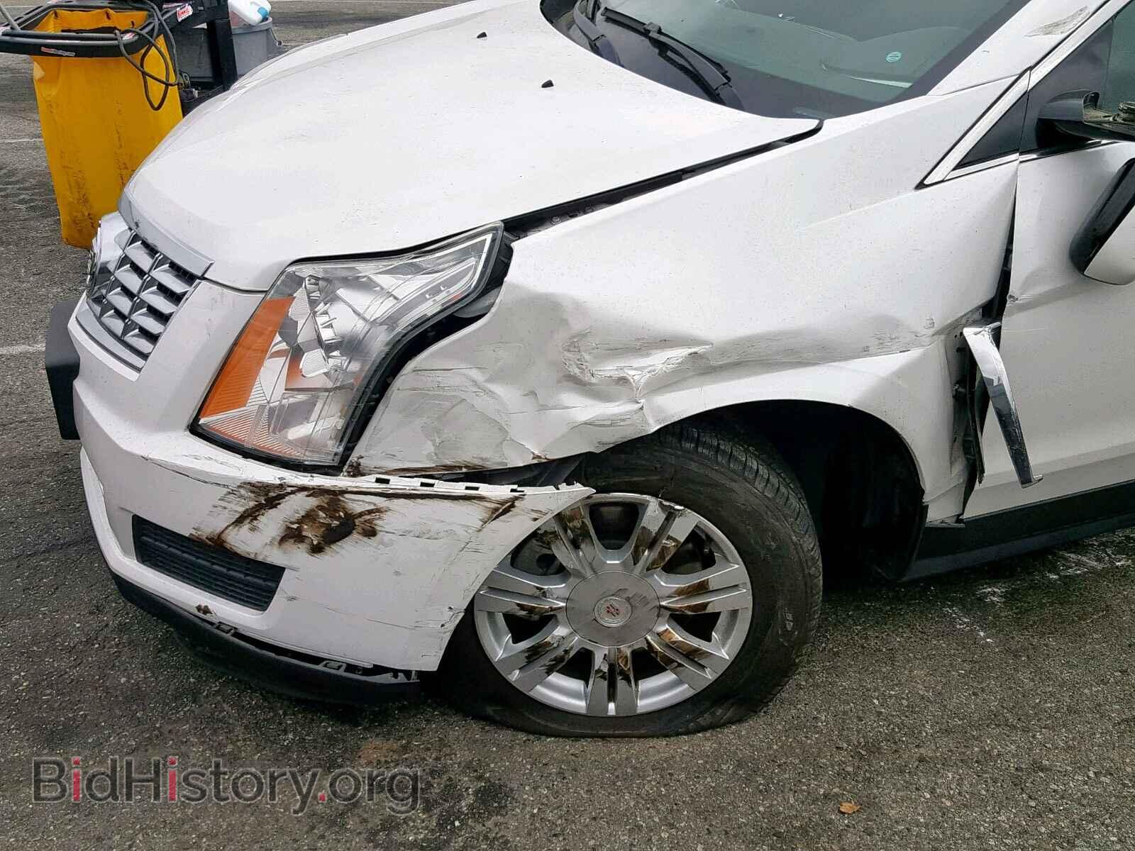 2014 CADILLAC SRX - VIN: 3GYFNAE3XES628792 - Фото 9