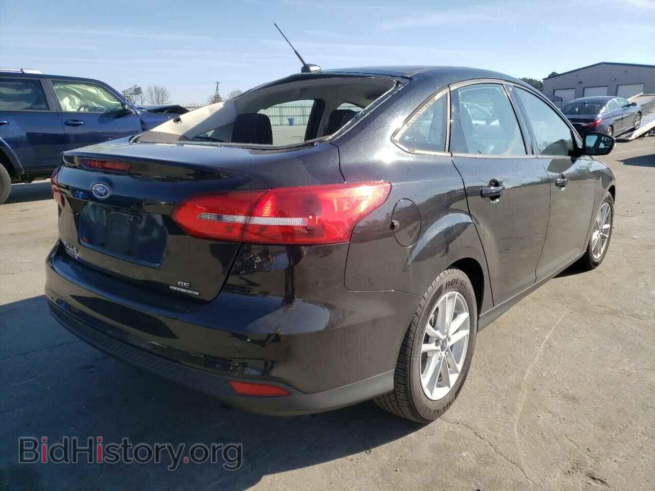 2015 FORD FOCUS - VIN: 1FADP3F29FL205790 - Photo 4