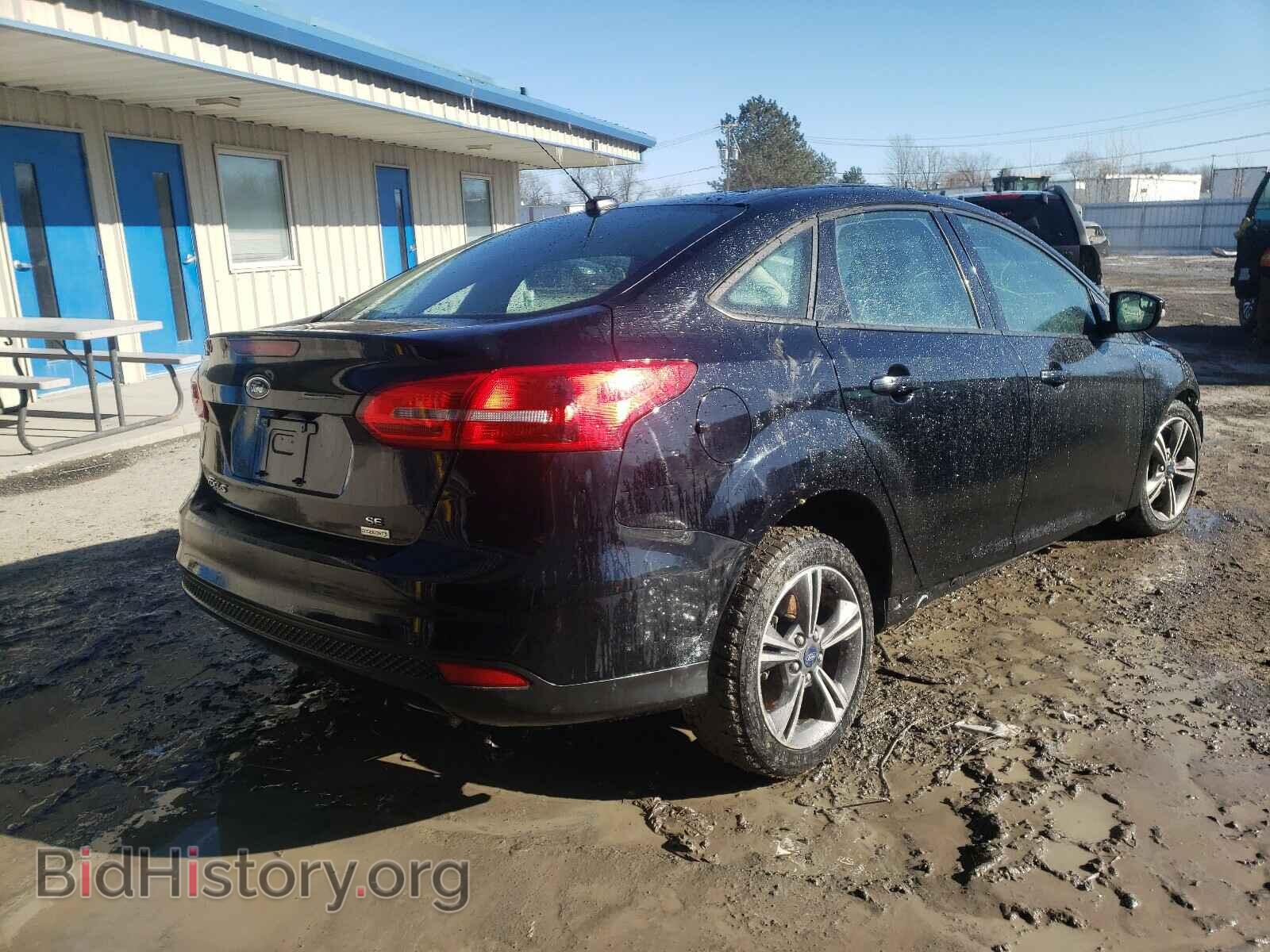 2017 FORD FOCUS - VIN: 1FADP3FE6HL321879 - Photo 4