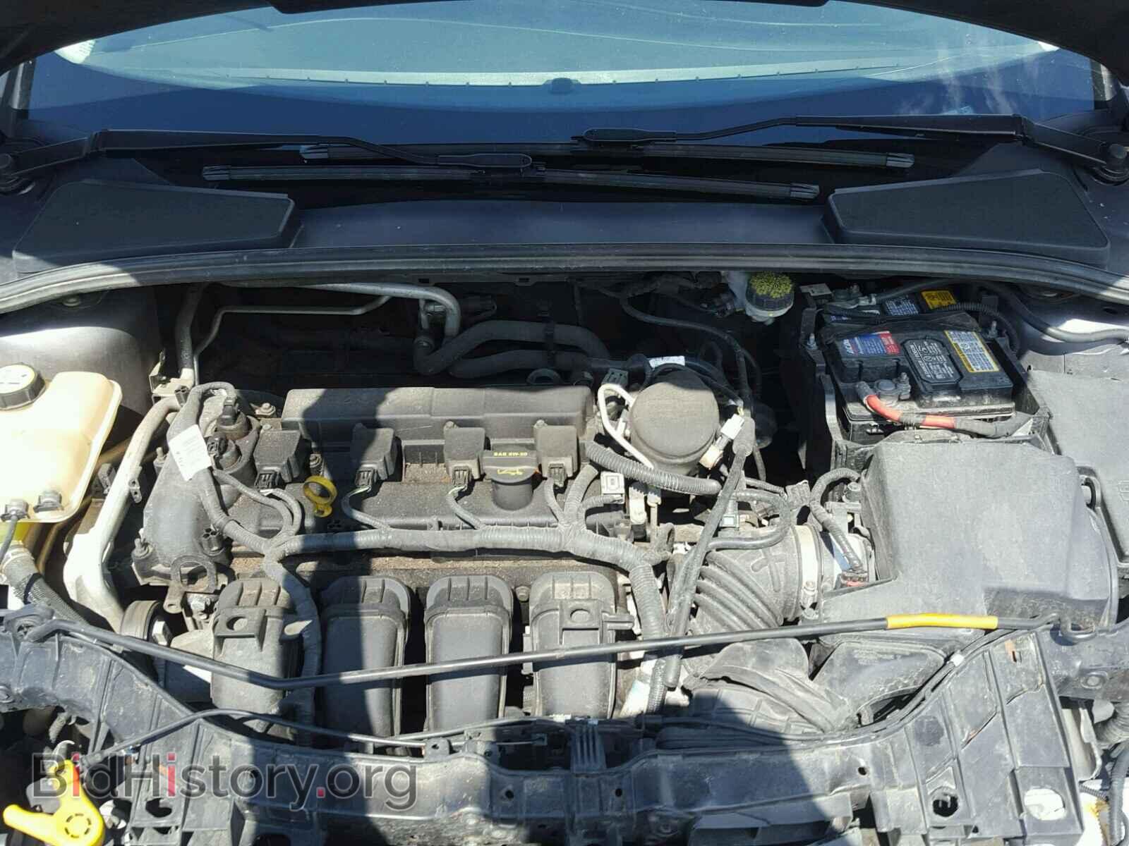 2012 Ford FOCUS (VIN 1FAHP3F28CL104558) — photo 7 of 10