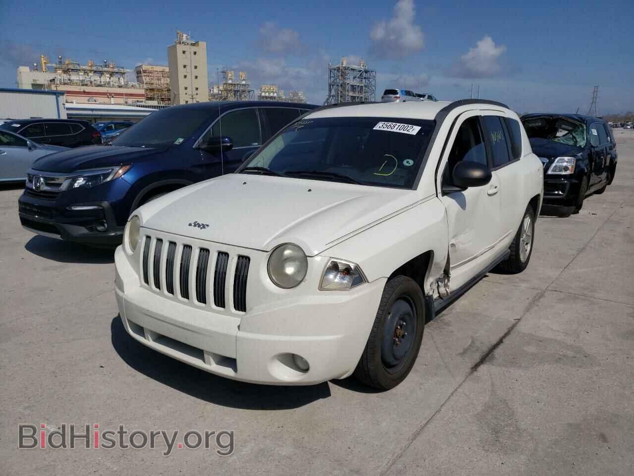 2010 JEEP COMPASS - VIN: 1J4NT4FA2AD506082 - Photo 2
