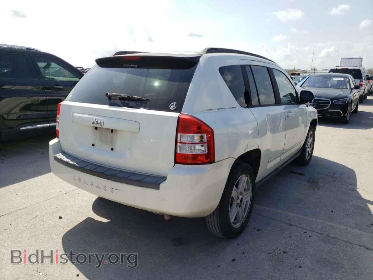 2010 JEEP COMPASS - VIN: 1J4NT4FA2AD506082 - Photo 4