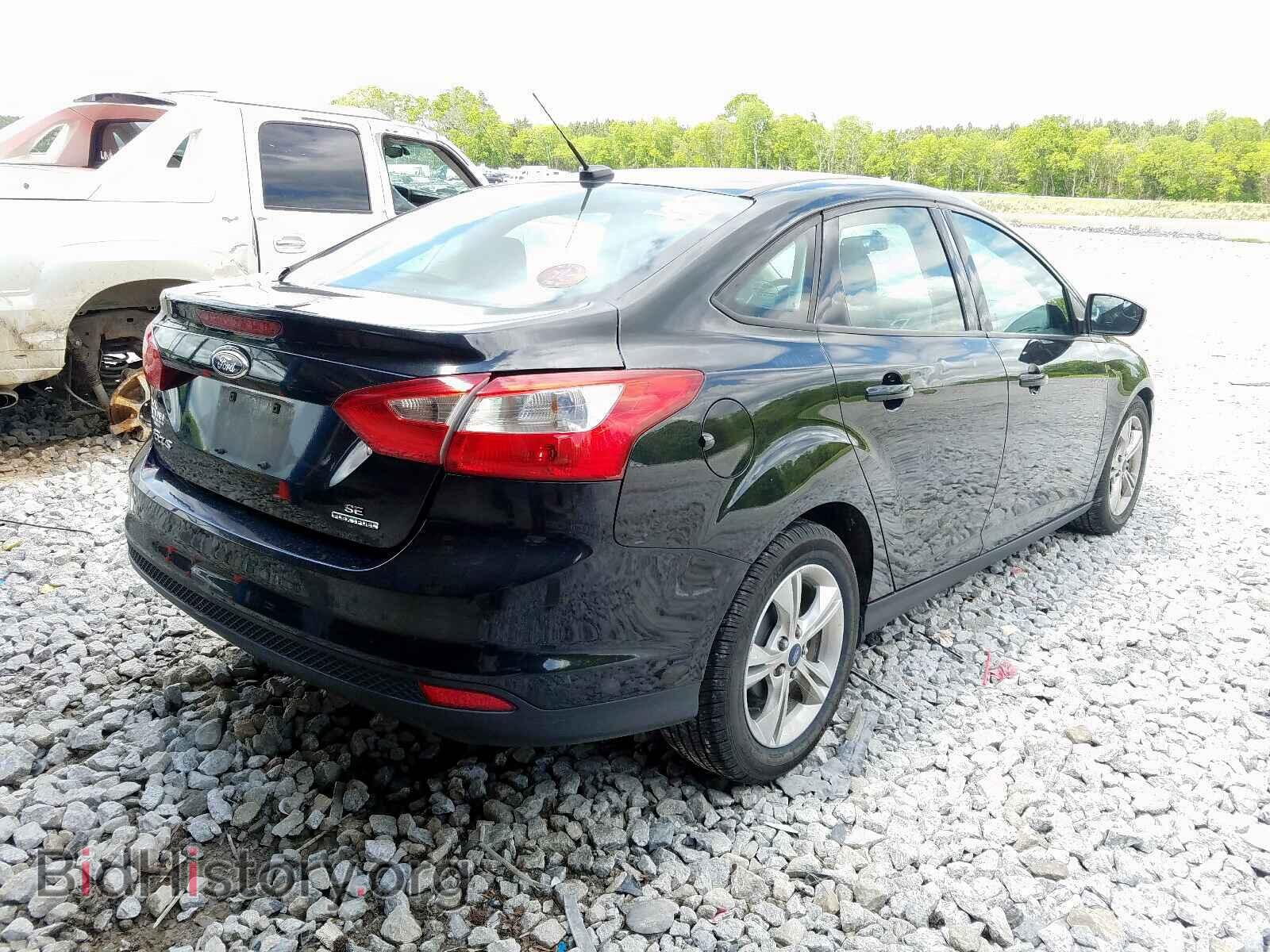 2014 FORD FOCUS - VIN: 1FADP3F29EL399977 - Photo 4