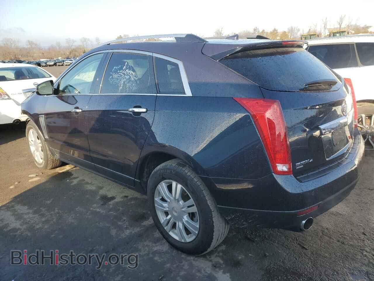 2014 CADILLAC SRX - VIN: 3GYFNEE30ES655801 - Фото 2