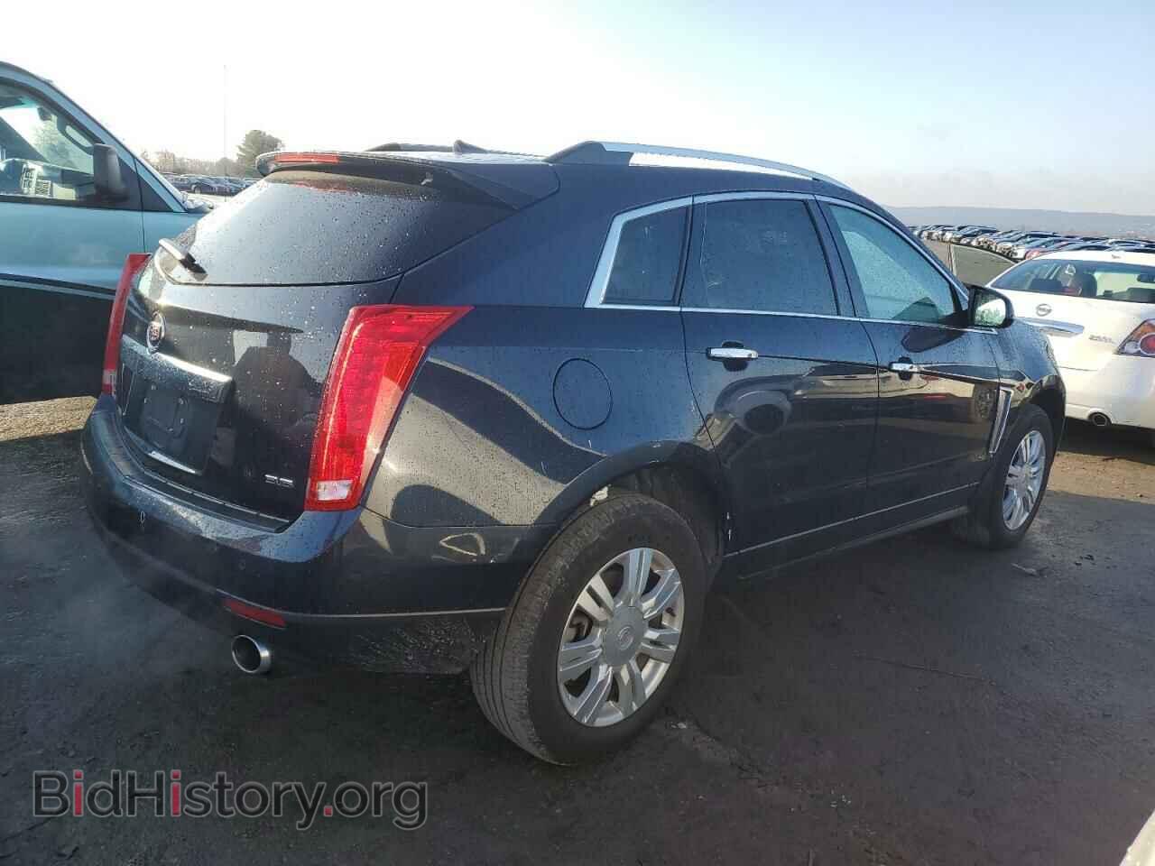2014 CADILLAC SRX - VIN: 3GYFNEE30ES655801 - Фото 3