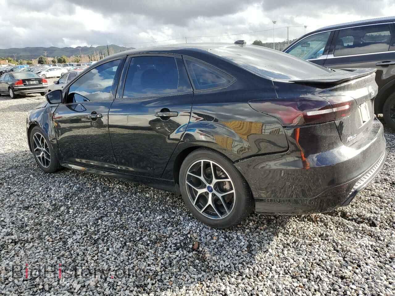 2016 FORD FOCUS - VIN: 1FADP3F25GL276065 - Фото 2