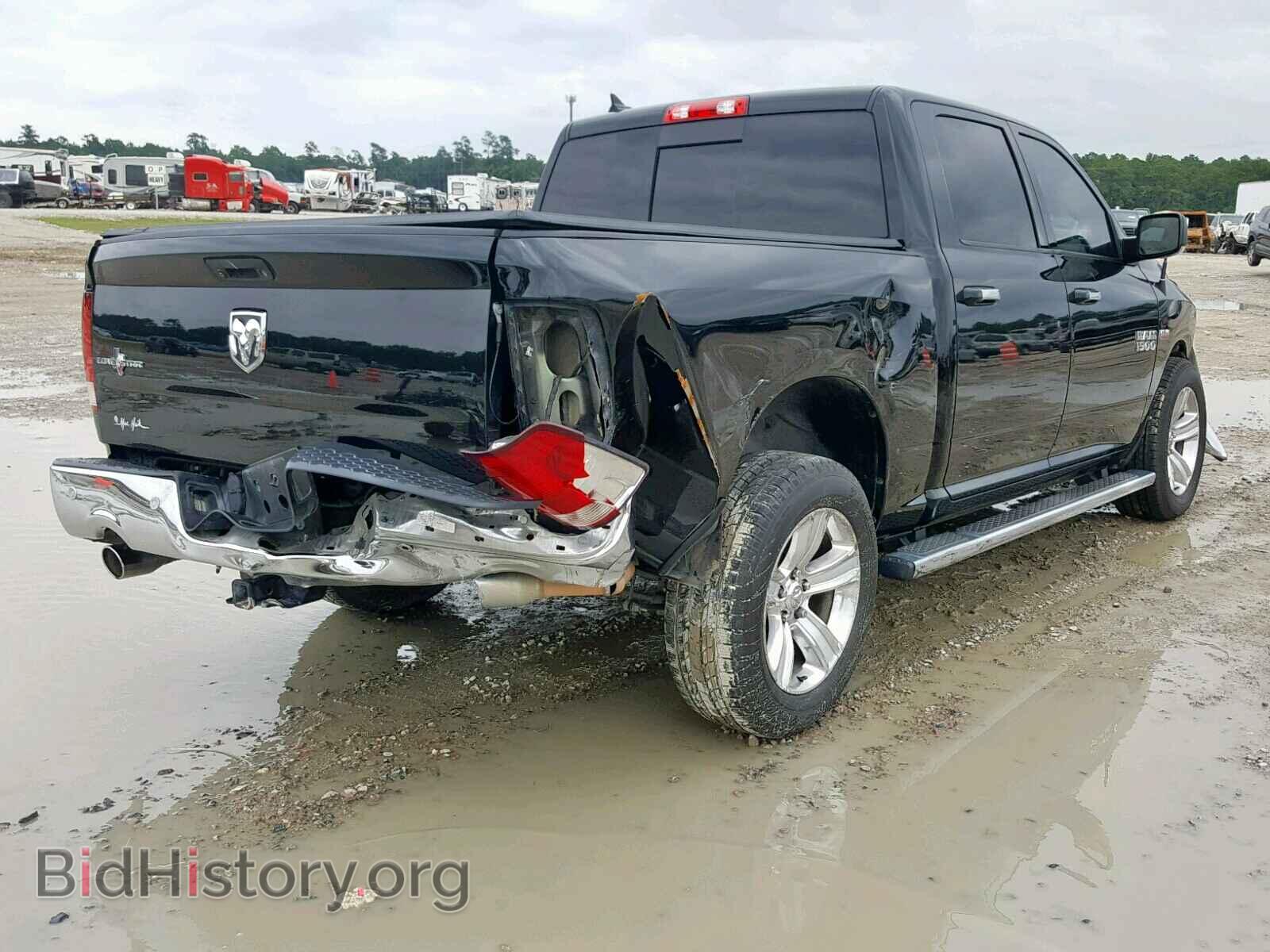2014 RAM 1500 SLT - VIN: 1C6RR6LT1ES424165 - Фото 4