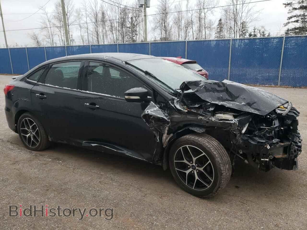 2015 FORD FOCUS - VIN: 1FADP3FE1FL245565 - Photo 4