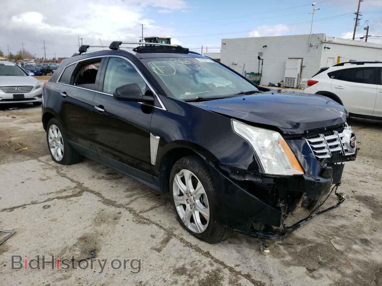 2015 CADILLAC SRX - VIN: 3GYFNCE32FS558220 - Фото 4