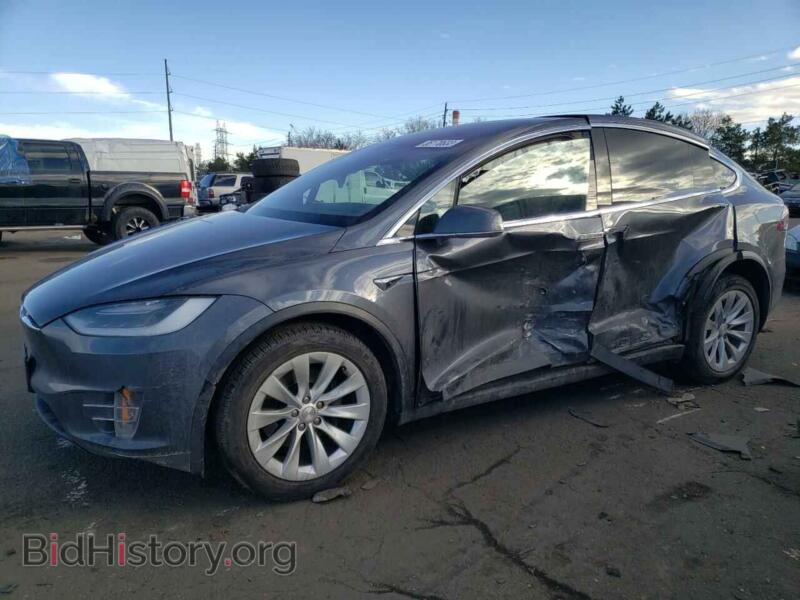 2018 Tesla MODEL X (VIN 5YJXCBE23JF101399) — photo 1 of 13, Copart, damage: side
