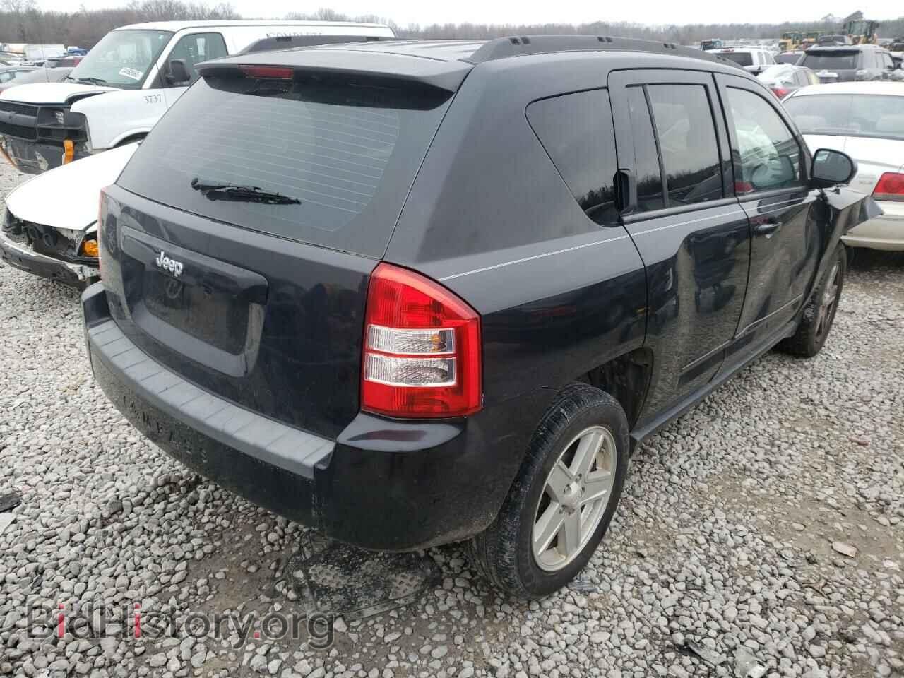 2010 JEEP COMPASS - VIN: 1J4NT4FB0AD521673 - Photo 4