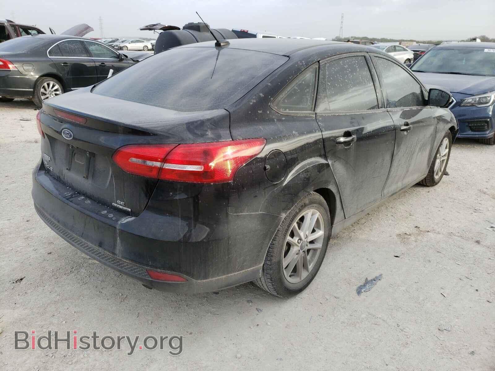 2016 FORD FOCUS - VIN: 1FADP3F21GL290772 - Photo 4