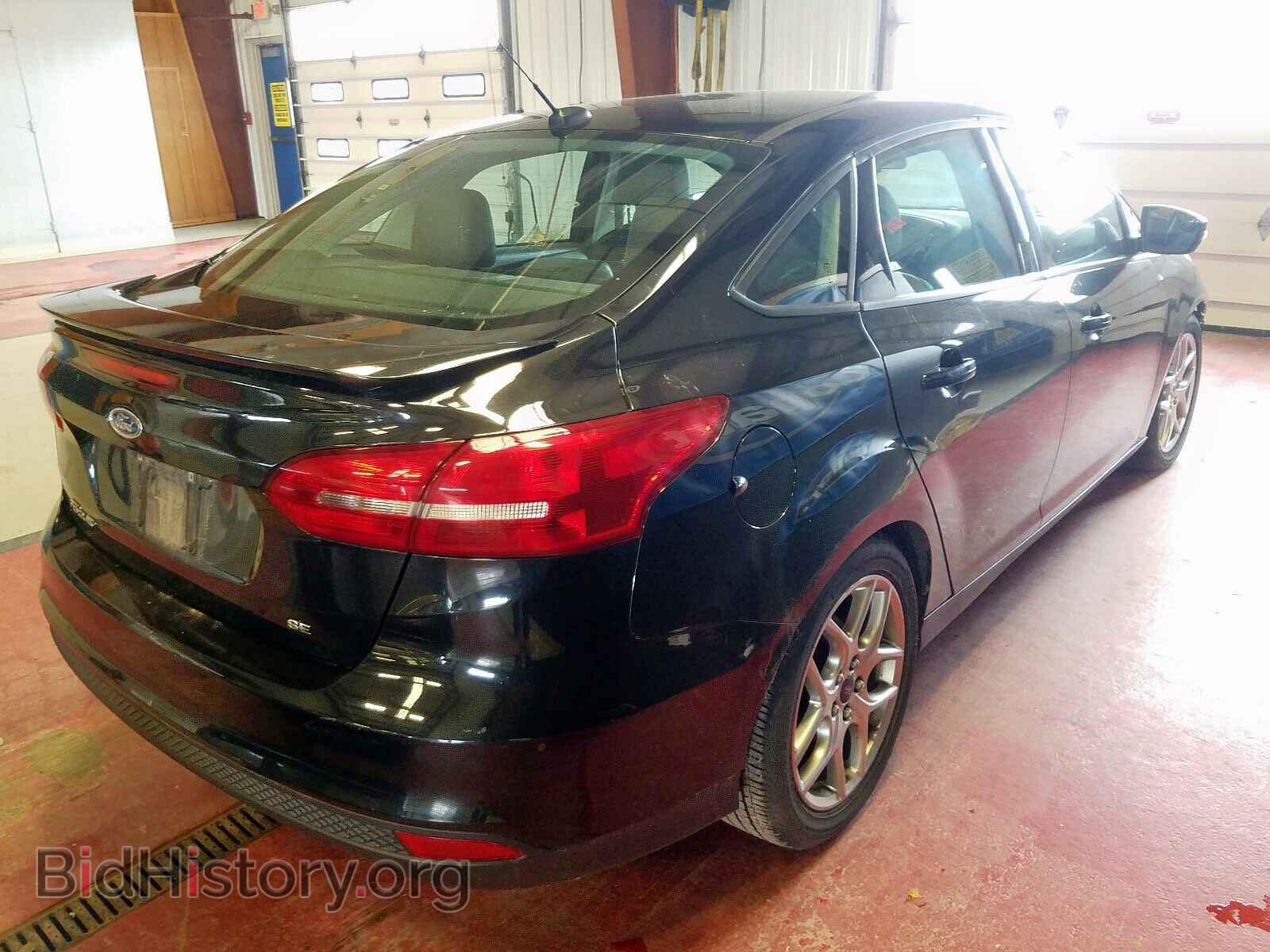 2015 FORD FOCUS - VIN: 1FADP3F2XFL280322 - Photo 4