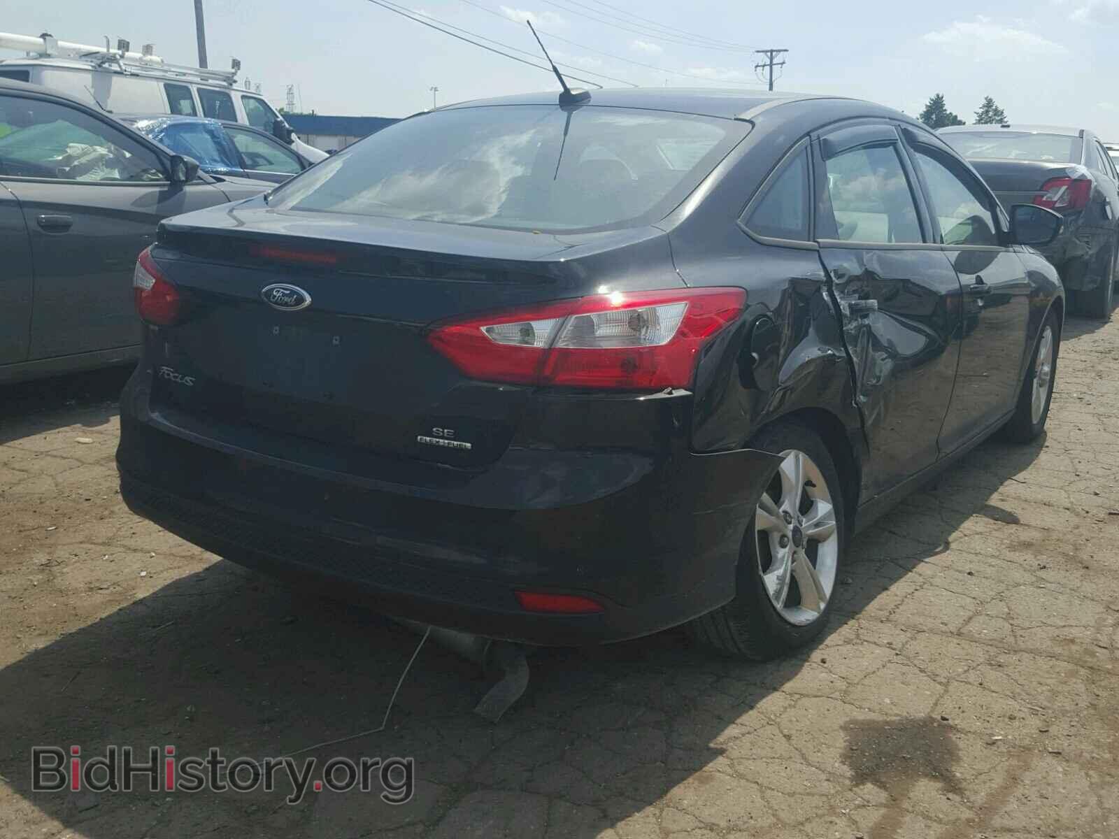 2014 FORD FOCUS - VIN: 1FADP3F26EL348100 - Photo 4