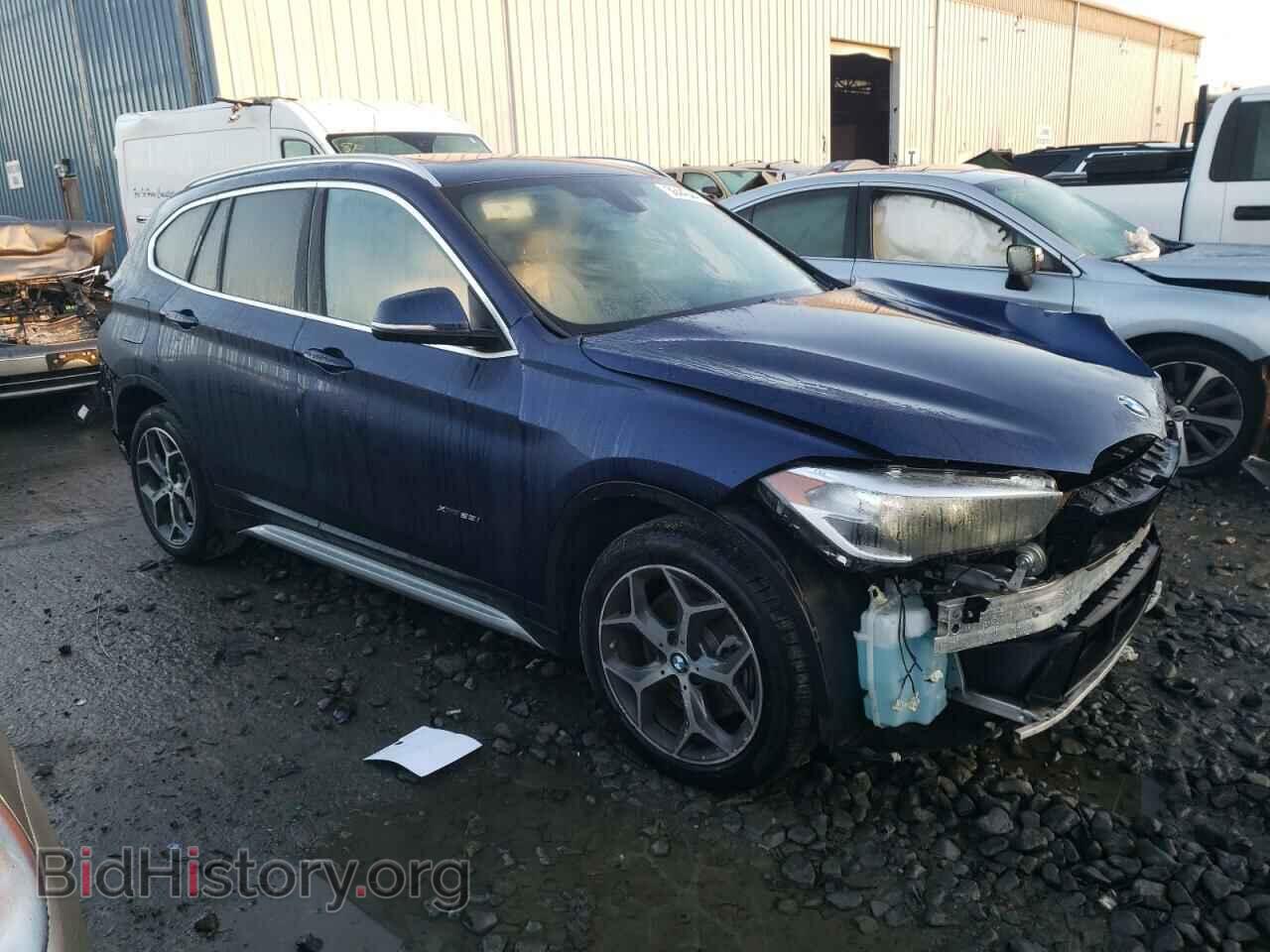 2017 BMW X1 - VIN: WBXHT3C39H5F74229 - Фото 4