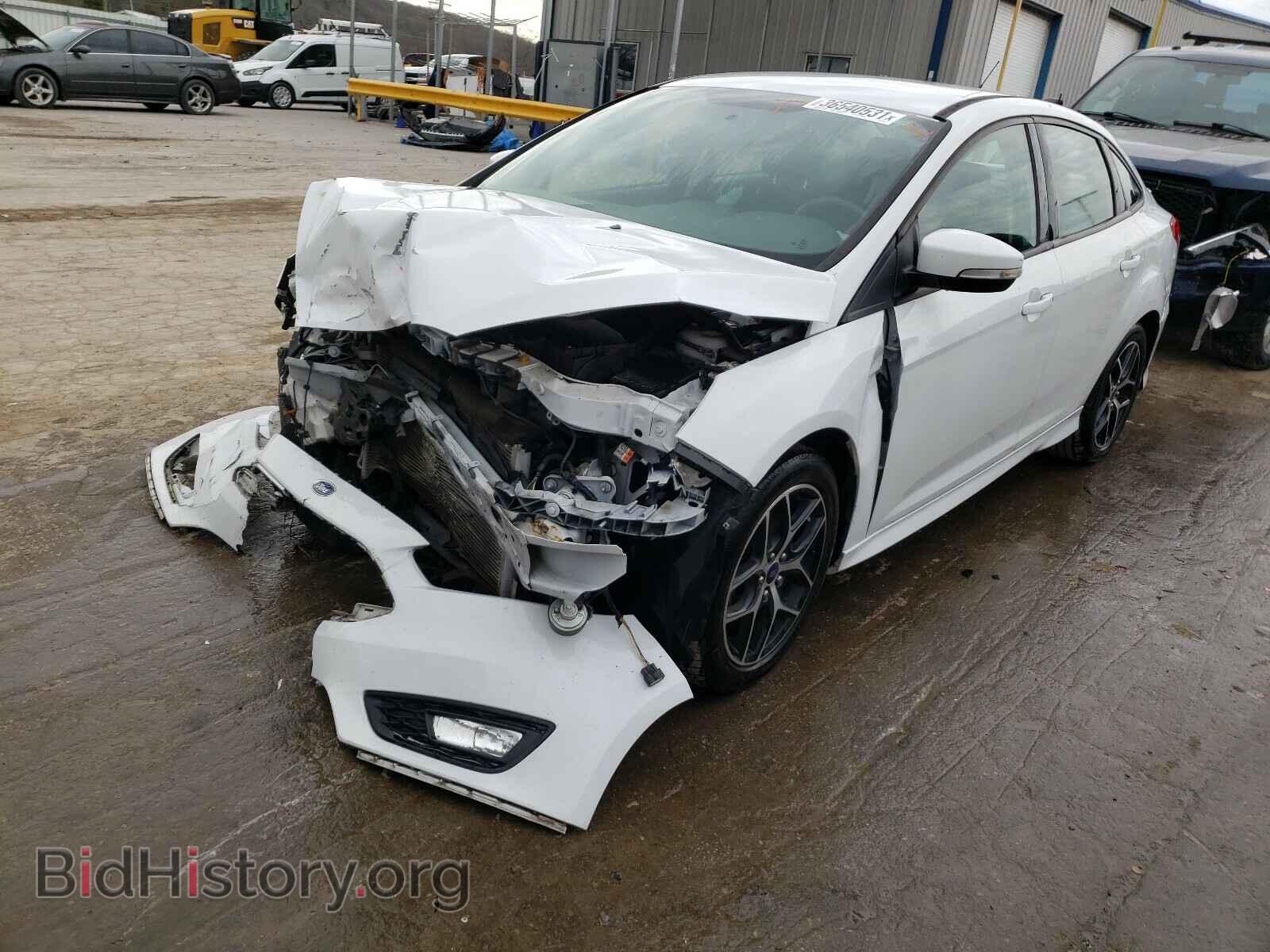 2016 FORD FOCUS - VIN: 1FADP3F20GL327942 - Фото 2