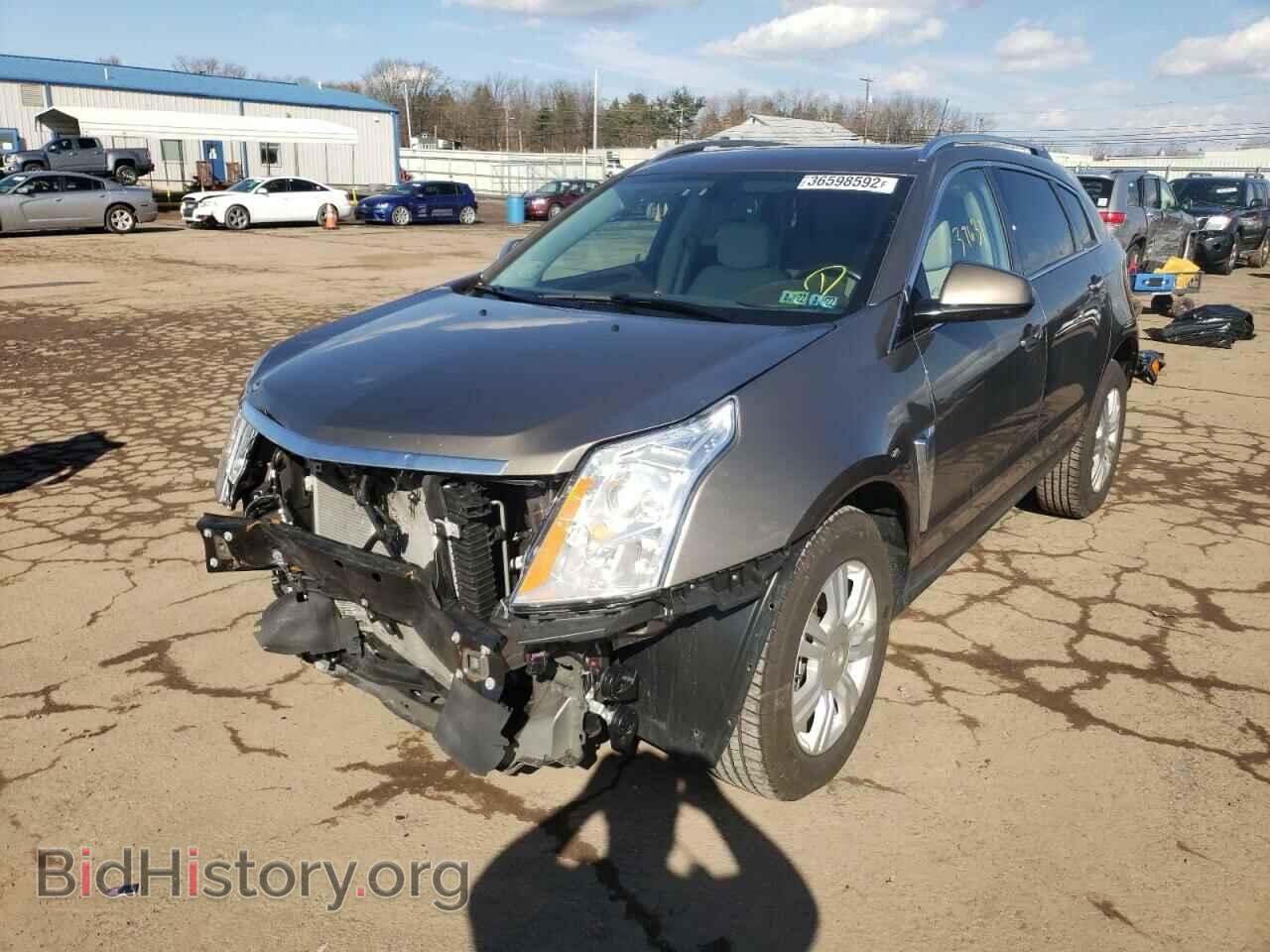 2014 CADILLAC SRX - VIN: 3GYFNBE33ES561782 - Фото 2