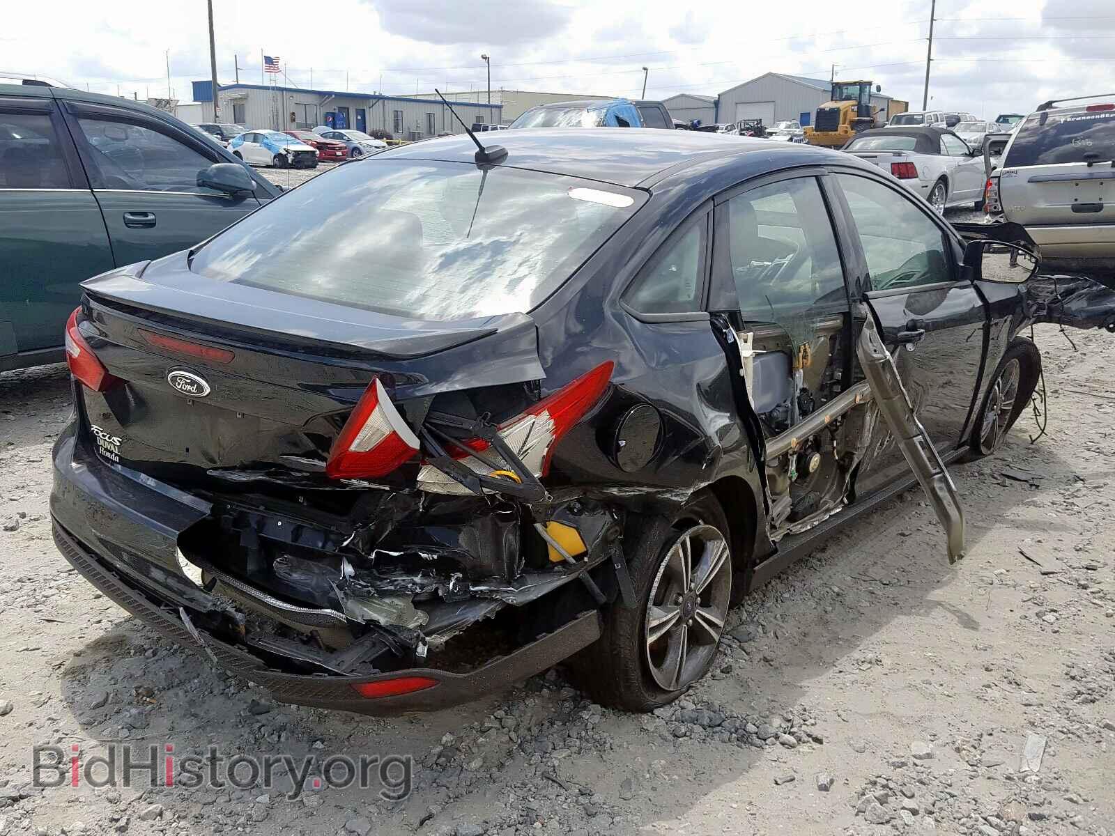 2014 FORD FOCUS - VIN: 1FADP3F2XEL227652 - Photo 4