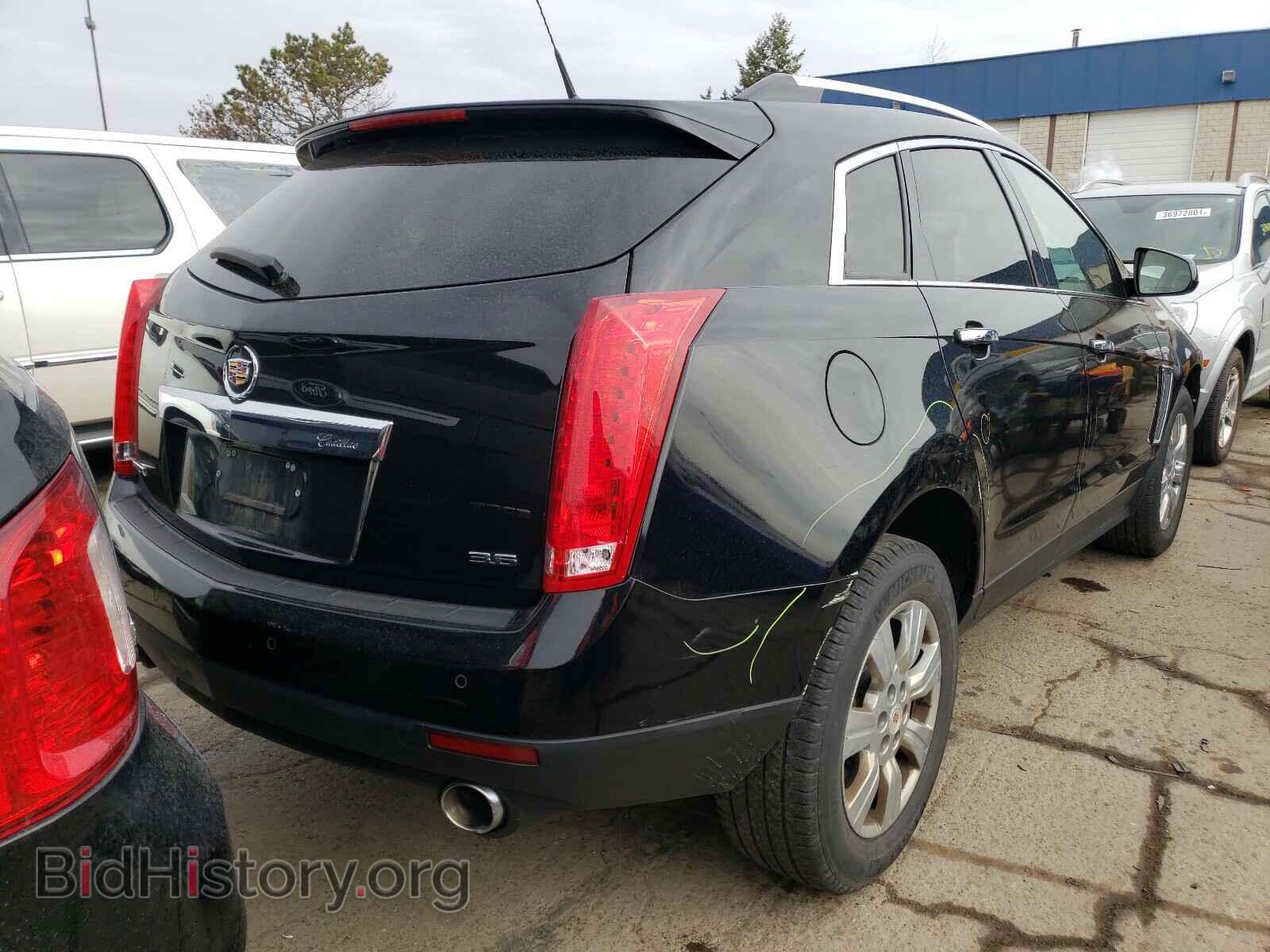 2014 CADILLAC SRX - VIN: 3GYFNBE39ES569398 - Фото 4