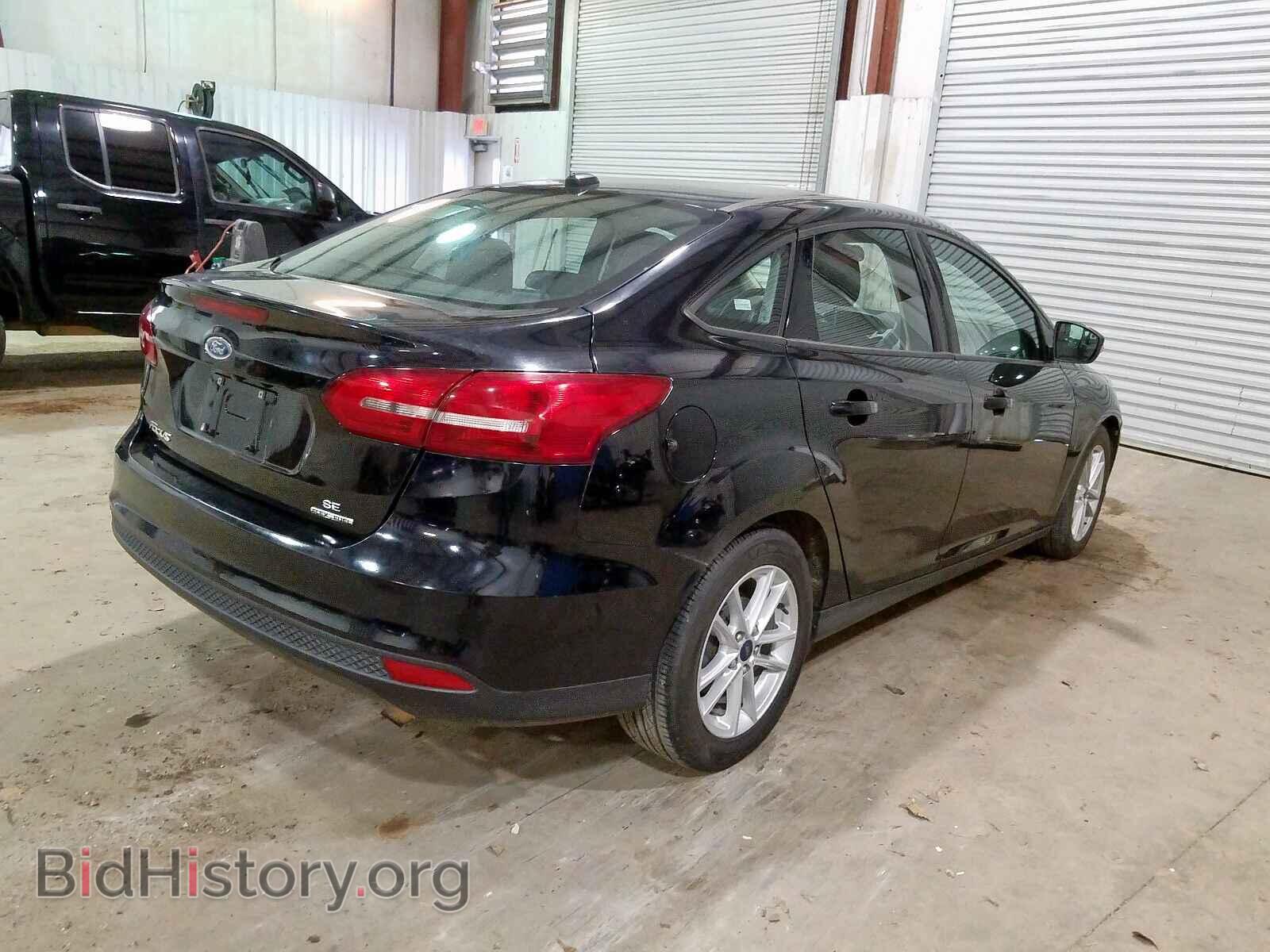 2016 FORD FOCUS - VIN: 1FADP3F29GL338986 - Photo 4