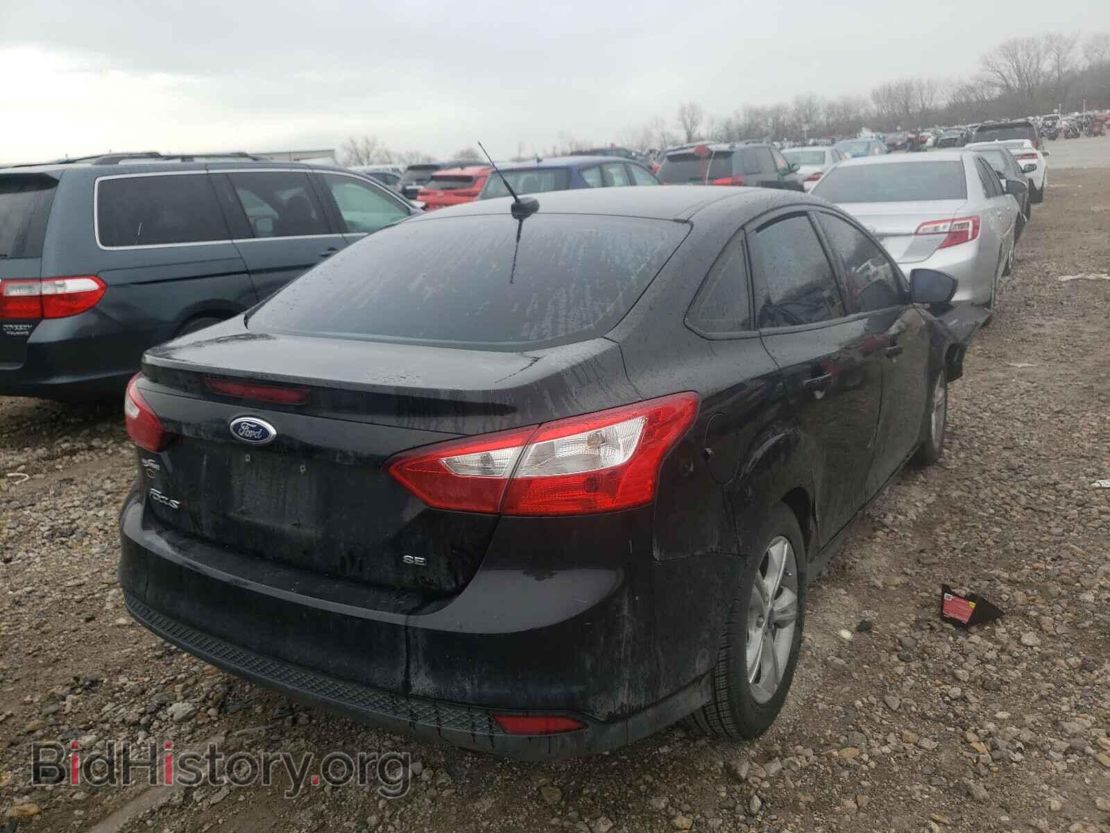 2014 FORD FOCUS - VIN: 1FADP3F20EL325833 - Photo 4