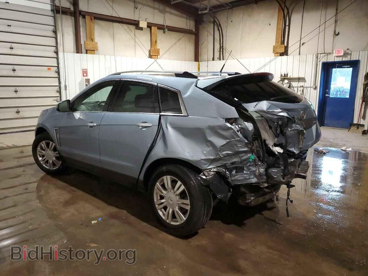 2014 CADILLAC SRX - VIN: 3GYFNBE30ES582900 - Фото 2
