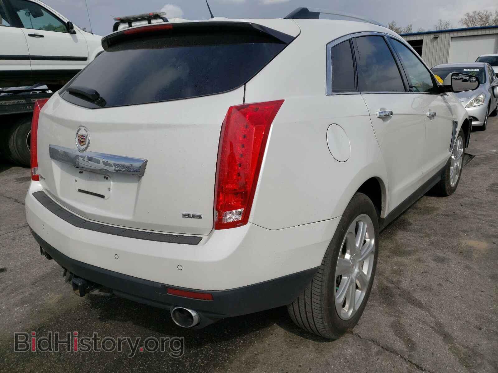 2015 CADILLAC SRX - VIN: 3GYFNDE38FS609919 - Фото 4