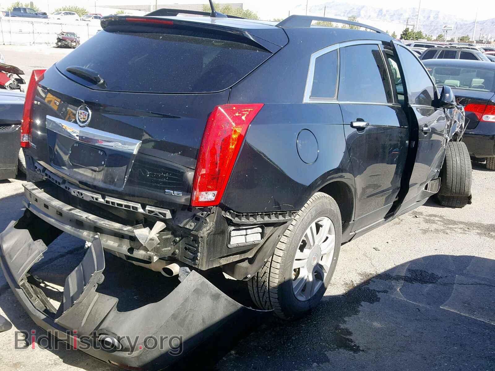 2014 CADILLAC SRX - VIN: 3GYFNAE31ES687195 - Фото 4