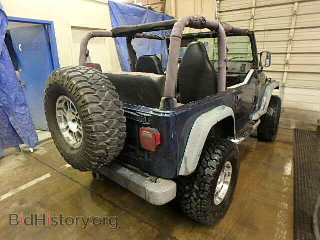 2000 JEEP WRANGLER - VIN: 1J4FA29P2YP730167 - Фото 4